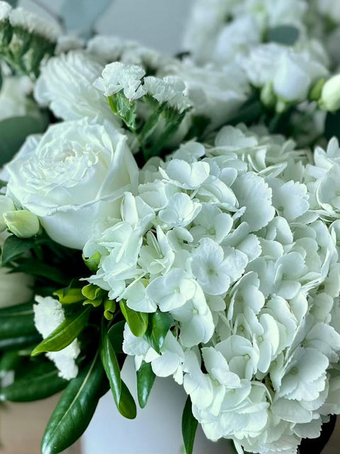 white vase arrangement
